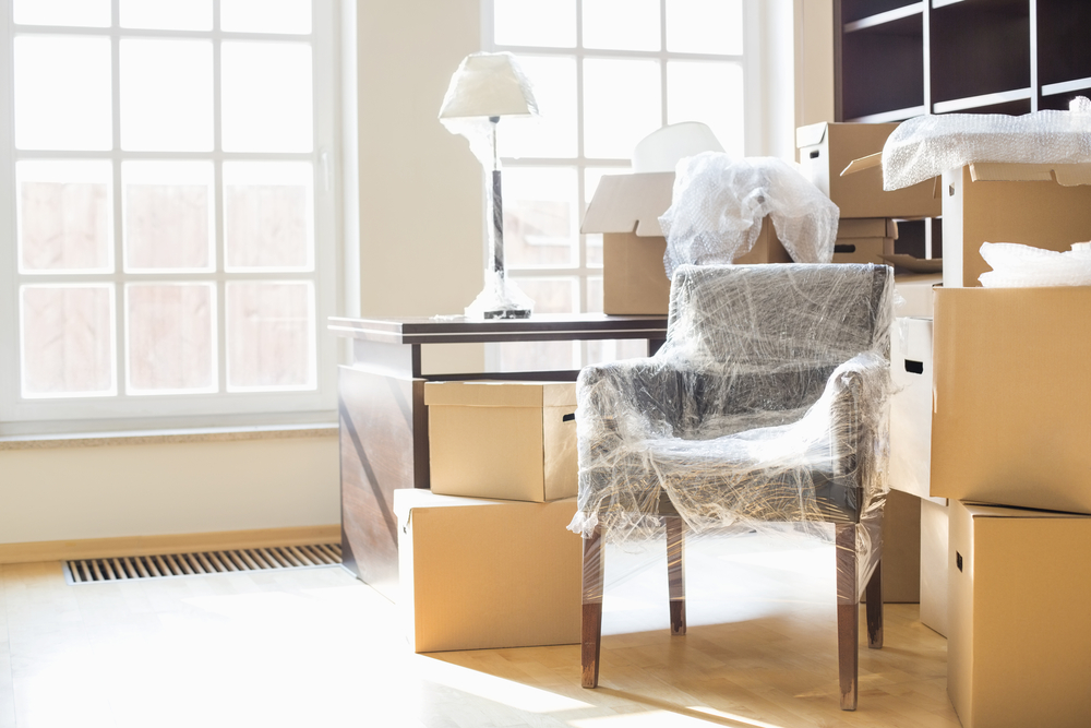 moving boxes and furniture in new home