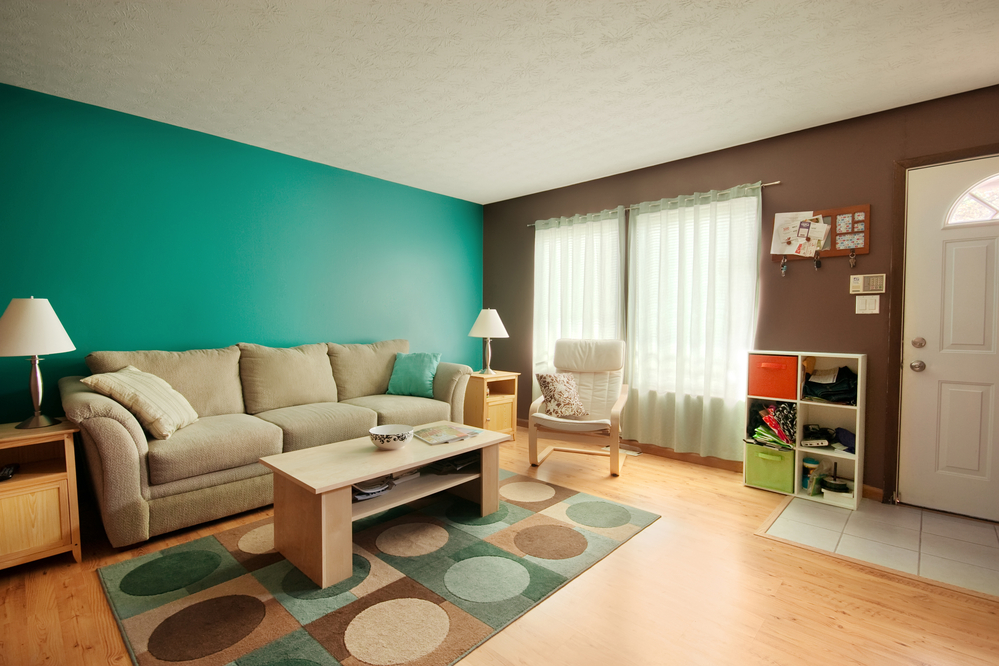 teal and brown family room